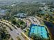 The community features many amenities, including a pool, clubhouse, parking and tennis courts, all surrounded by lush landscaping at 12468 Shimmering Oak Cir, Venice, FL 34293