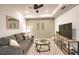 Relaxing living room with comfortable seating, modern decor, and ample space at 12580 Galapagos Ct # 107, Venice, FL 34293