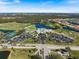 Aerial view of Pelican Point Golf and Country Club community and golf course at 1298 Highland Greens Dr, Venice, FL 34285