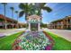 Welcome to Venice, Florida, marked by a beautiful floral entrance and quaint street at 1298 Highland Greens Dr, Venice, FL 34285