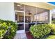 Exterior view of the screened lanai, accessible from inside the home at 1298 Highland Greens Dr, Venice, FL 34285
