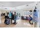 Golf shop interior showcasing golf bags, clothing, and accessories on display at 1298 Highland Greens Dr, Venice, FL 34285