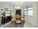Traditional dining area featuring furniture on top of a patterned area rug at 13730 Vancanza, Venice, FL 34293