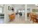 Bright foyer featuring tile floors that leads to an open-concept living space at 13730 Vancanza, Venice, FL 34293