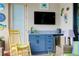 The covered lanai has a granite wet bar and stainless steel mini-refrigerator at 13730 Vancanza, Venice, FL 34293