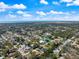 Aerial view of a neighborhood with single-Gathering homes and lush greenery at 225 Randolph Rd, Venice, FL 34293