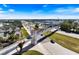 Aerial view of a pedestrian bridge spanning over a busy city street and green spaces at 225 Randolph Rd, Venice, FL 34293