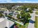 An aerial view of the property showing a home with a backyard patio and well-maintained landscaping at 225 Randolph Rd, Venice, FL 34293