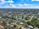 Aerial view of a residential area with a home highlighted by a blue border at 225 Randolph Rd, Venice, FL 34293
