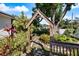 Stone walkway going underneath a wooden archway on the side of the house in the backyard at 225 Randolph Rd, Venice, FL 34293