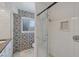 Elegant bathroom with a tiled shower and designer accents, offers a luxurious retreat at 225 Randolph Rd, Venice, FL 34293