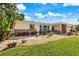 A well manicured lawn and stone accents highlight the home's exterior at 225 Randolph Rd, Venice, FL 34293