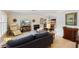 Bright living room boasts stylish decor, comfortable seating, and plenty of natural light at 225 Randolph Rd, Venice, FL 34293