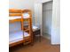 Bedroom with bunk beds and closet for ample storage at 2863 Twinkle Ave, North Port, FL 34286
