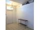Entryway with tiled floor, a console table, and natural light at 2863 Twinkle Ave, North Port, FL 34286