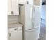 Kitchen view with white refrigerator and cabinet at 2863 Twinkle Ave, North Port, FL 34286