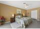 Cozy main bedroom with polished floors and a walk-in closet at 424 Shade Ter, Venice, FL 34293
