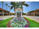 Welcoming Venice sign surrounded by colorful flowers creating a picturesque entrance to the city at 630 Bird Bay E Dr # 208, Venice, FL 34285