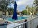 Cool off at the sparkling community pool with ample seating and shaded areas for relaxation at 630 Bird Bay E Dr # 208, Venice, FL 34285
