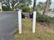 Navigating to Phase 5 Pool direction with arrow for ease at 630 Bird Bay E Dr # 208, Venice, FL 34285