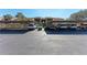 Assigned covered parking for residents in this condo community offers shelter and convenience at 630 Bird Bay E Dr # 208, Venice, FL 34285