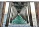 View looking out to the Gulf from under the Venice Fishing Pier in Venice, Florida at 630 Bird Bay E Dr # 208, Venice, FL 34285