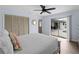 Bright main bedroom with access to the lanai and pool area at 8 Bunker Ln, Rotonda West, FL 33947
