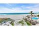 Coastal view of the beach and pool at 840 The Esplanade N # 301, Venice, FL 34285