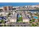 Aerial view showcases the condo's location, close to the beach, amenities, and stunning waterfront views at 995 Laguna Drive # 303, Venice, FL 34285