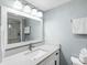 Bathroom featuring a modern vanity with a large mirror and shower at 995 Laguna Drive # 303, Venice, FL 34285