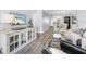 Comfortable living room showcasing stylish furniture, decor, and flooring at 995 Laguna Drive # 303, Venice, FL 34285