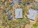 Overhead aerial view of condo buildings within a tree-filled community at 1051 Forrest Nelson Blvd # A-103, Port Charlotte, FL 33952