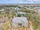 Scenic aerial view of the condo building, community, and surrounding area on a sunny day at 1051 Forrest Nelson Blvd # A-103, Port Charlotte, FL 33952