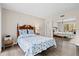Charming bedroom with ample closet space, wooden furniture, and neutral walls at 1051 Forrest Nelson Blvd # A-103, Port Charlotte, FL 33952