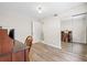 Bedroom with wood-look flooring and mirrored closet doors at 1051 Forrest Nelson Blvd # A-103, Port Charlotte, FL 33952