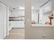 Well-lit kitchen with white cabinetry and modern appliances, adjacent to the dining area at 1051 Forrest Nelson Blvd # A-103, Port Charlotte, FL 33952