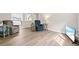 Comfortable living room with modern floors, neutral walls, and plenty of natural light at 1051 Forrest Nelson Blvd # A-103, Port Charlotte, FL 33952