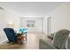 Bright living room featuring modern flooring, neutral paint and natural light at 1051 Forrest Nelson Blvd # A-103, Port Charlotte, FL 33952