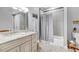 Stylish bathroom featuring a vanity with granite countertops and a shower-tub combination at 1115 Gladstone Blvd, Englewood, FL 34223