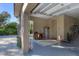 Two car garage with water heater and bicycles at 1115 Gladstone Blvd, Englewood, FL 34223