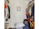Organized walk-in closet with ample shelving and storage space for clothes and accessories at 1115 Gladstone Blvd, Englewood, FL 34223