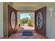 Front entryway featuring elegant brick flooring and double doors with decorative glass at 126 Wading Bird Dr, Venice, FL 34292