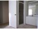 Bright bathroom featuring a vanity with a mirror and a glass-enclosed shower stall at 157 Algiers Dr, Venice, FL 34293