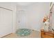Welcoming foyer featuring a decorative rug and ample natural light at 1610 Monarch Dr # 1610, Venice, FL 34293