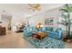 Open living room featuring tile flooring and two comfortable sofas at 1610 Monarch Dr # 1610, Venice, FL 34293