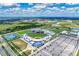 Baseball stadium aerial shows the field, parking, and the grounds of the community's baseball facilities at 18135 Home Run Dr, Venice, FL 34293