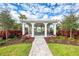 Charming open gazebo with picnic tables surrounded by lush landscaping and trees at 18135 Home Run Dr, Venice, FL 34293