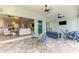 Screened patio featuring an outdoor seating area with views to the main living area at 18135 Home Run Dr, Venice, FL 34293