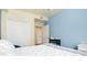 Comfortable, stylish bedroom featuring closet space and an ample amount of natural light at 20181 Ragazza Cir # 101, Venice, FL 34293