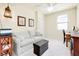 Bedroom featuring natural light, neutral toned walls, and decorative lighting fixtures at 20181 Ragazza Cir # 101, Venice, FL 34293